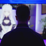 Male person silhouette watch anime vtuber stream on big television screen